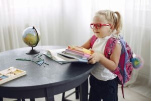 child with ADD ADHD looking for lost homework improve memory by practicing yoga